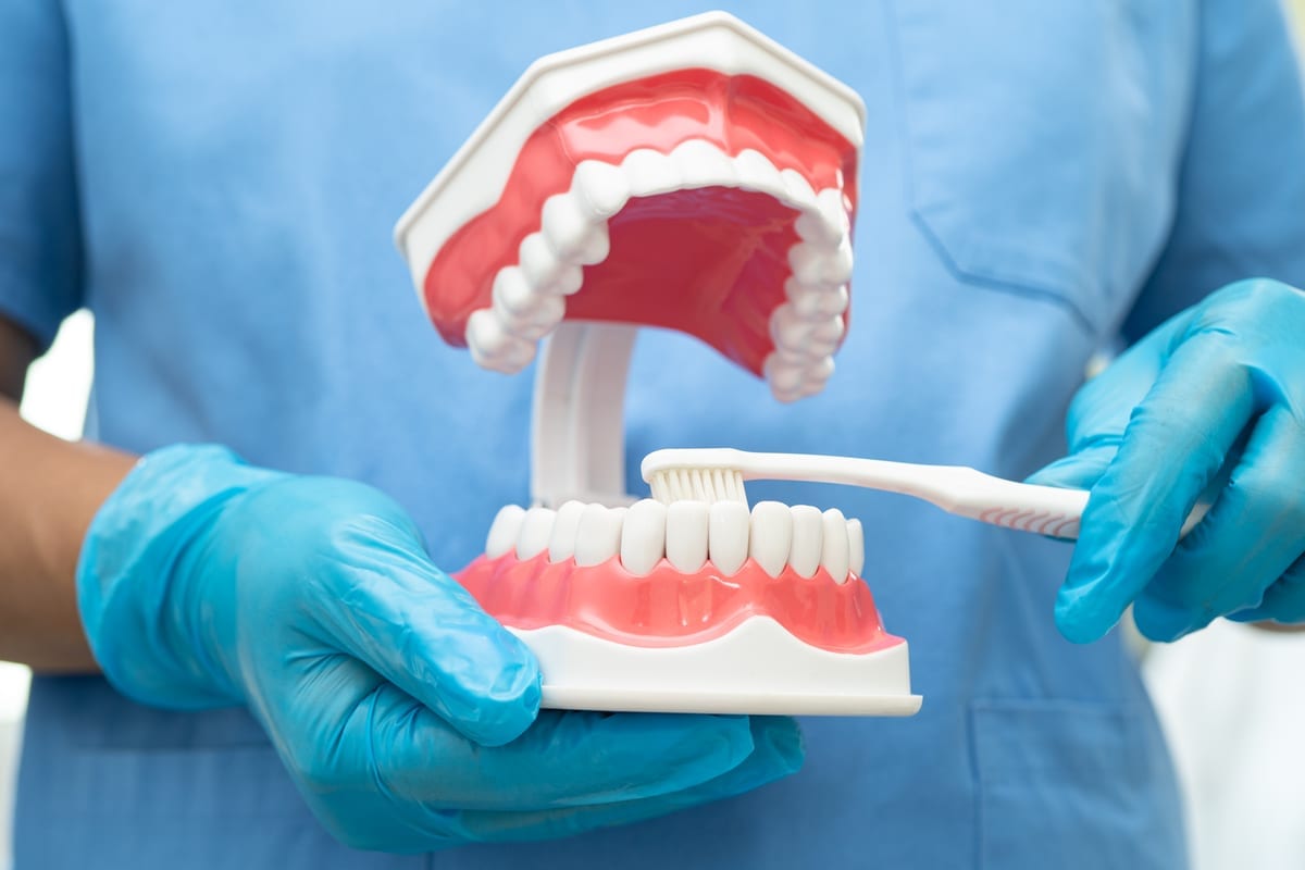 Why Your Dentist Might Recommend Deep Cleaning Over Regular Cleaning