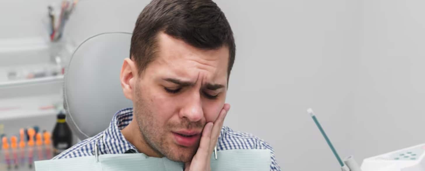 how do you get a broken tooth out of your mouth